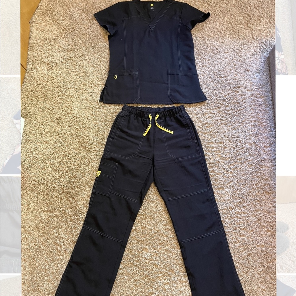 black set of scrubs with yellow ties